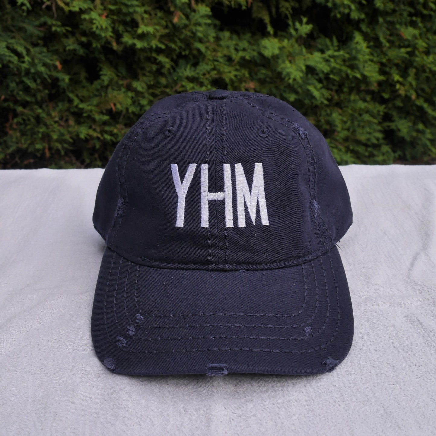 YHM Designs Airport Code Distressed Dad Hat with Air Force Lettering 02
