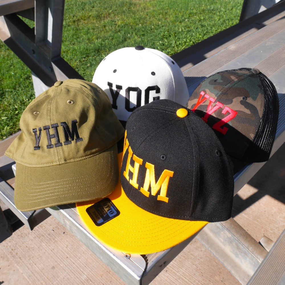YHM Designs College-Style Airport Code Hat Collection - Image 01