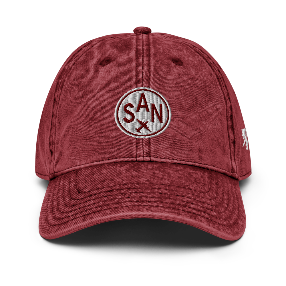 YHM Designs - SAN San Diego Airport Code Vintage Roundel Vintage Washed Baseball Cap - Travel Gifts for Men and Women - Maroon 01